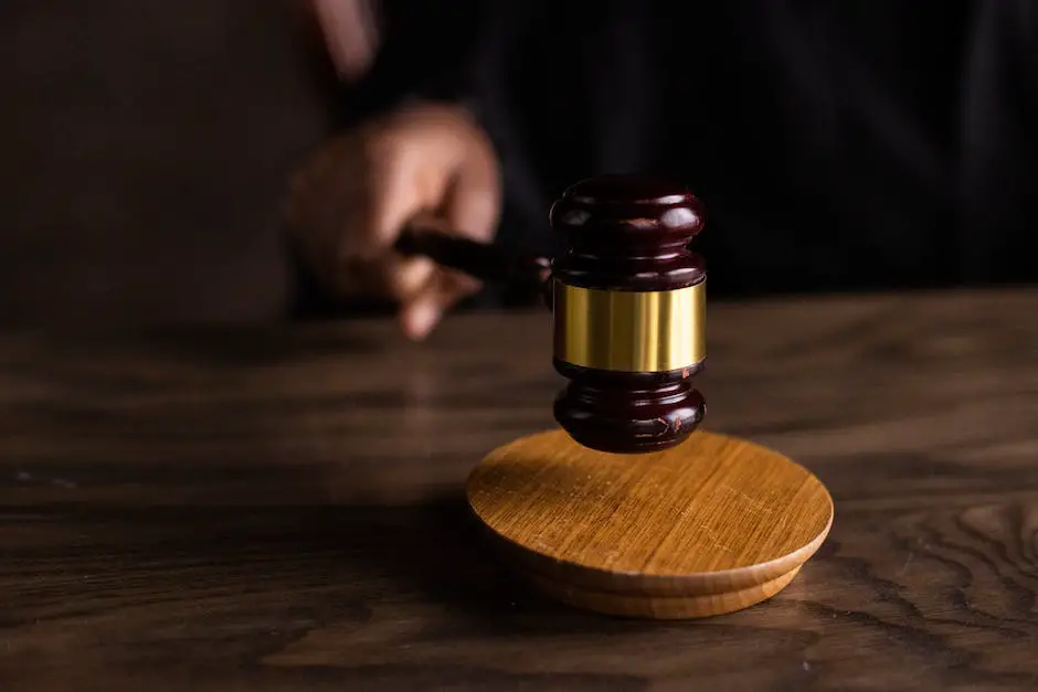 Image description: A person holding a gavel, representing a personal injury lawyer.